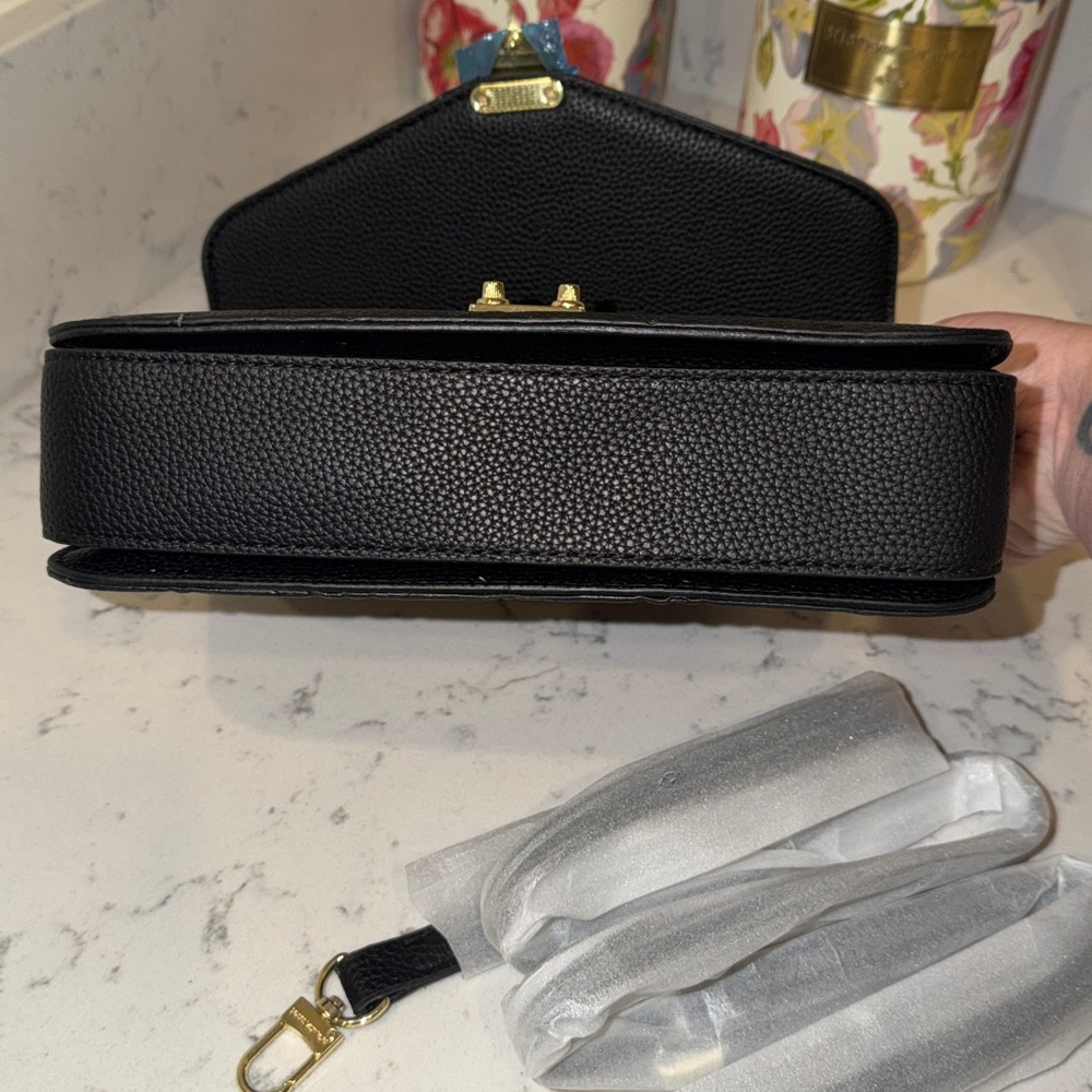 Louis Vuitton Black Embossed Monogram Satchel with Gold-Tone Lock - Picture 6 of 10